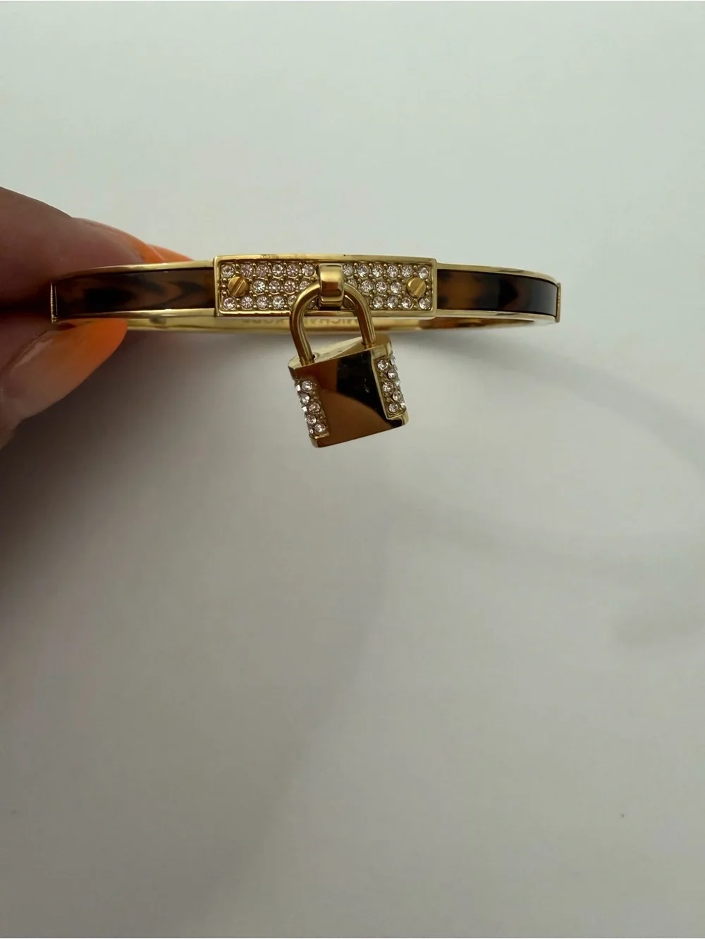 Michael Kors gold tone